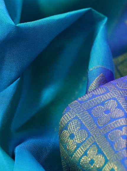 Pure kanchipuram silk saree dual shade of teal blue and dual shade of blue with zari woven buttas and zari woven border