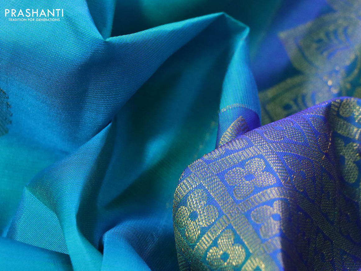 Pure kanchipuram silk saree dual shade of teal blue and dual shade of blue with zari woven buttas and zari woven border