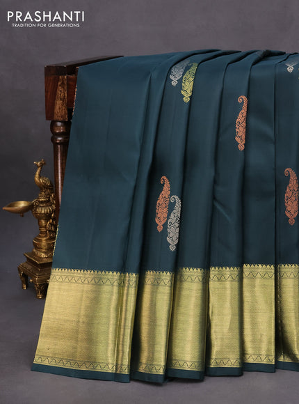 Pure kanchipuram silk saree dark peacock green with zari woven buttas and rich zari woven border