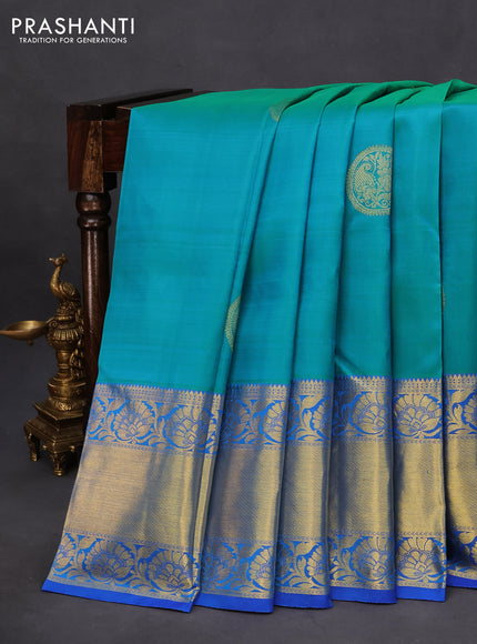 Pure kanchipuram silk saree dual shade of teal bluish green and blue with zari woven buttas and long rich zari woven border