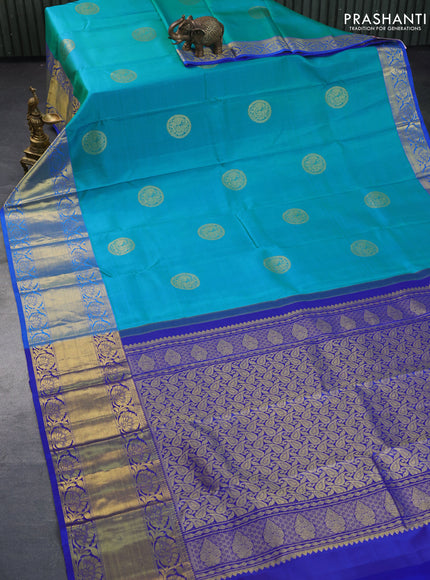 Pure kanchipuram silk saree dual shade of teal bluish green and blue with zari woven buttas and long rich zari woven border