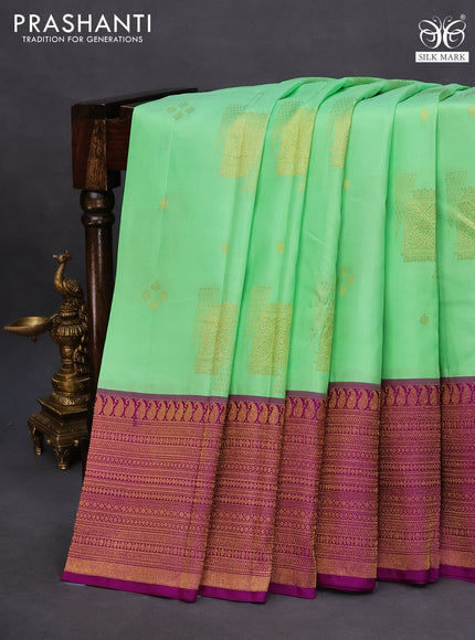 Pure kanchipuram silk saree pista green and purple with zari woven buttas and long rich zari woven border