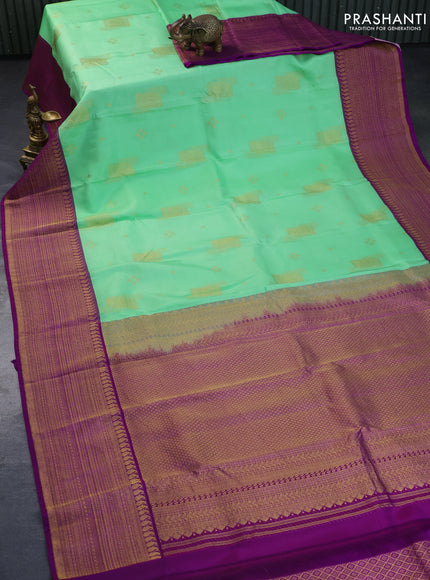 Pure kanchipuram silk saree pista green and purple with zari woven buttas and long rich zari woven border