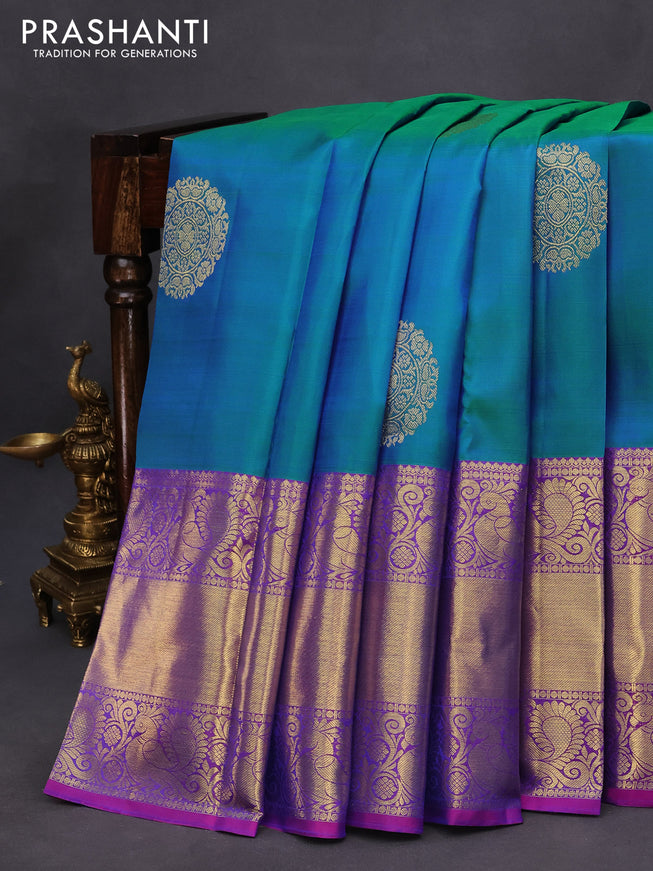 Pure kanchipuram silk saree dual shade of teal blue and purple with zari woven buttas and annam zari woven border