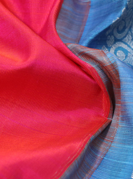 Pure kanchipuram silk saree dual shade of pinkish orange and blue shade with silver zari woven buttas and rich silver zari woven border