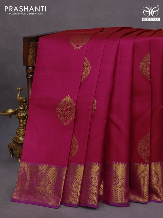 Pure kanchipuram silk saree dual shade of pink and dark blue with copper zari woven buttas and copper zari woven border