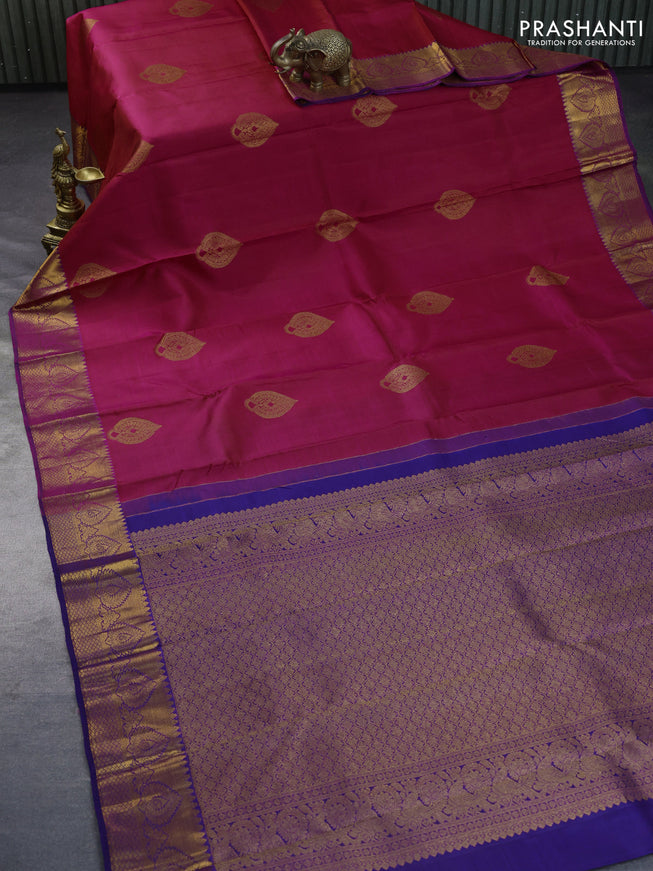 Pure kanchipuram silk saree dual shade of pink and dark blue with copper zari woven buttas and copper zari woven border