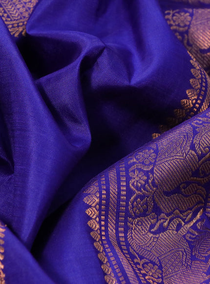 Pure kanchipuram silk saree blue with copper zari woven buttas and copper zari woven annam border