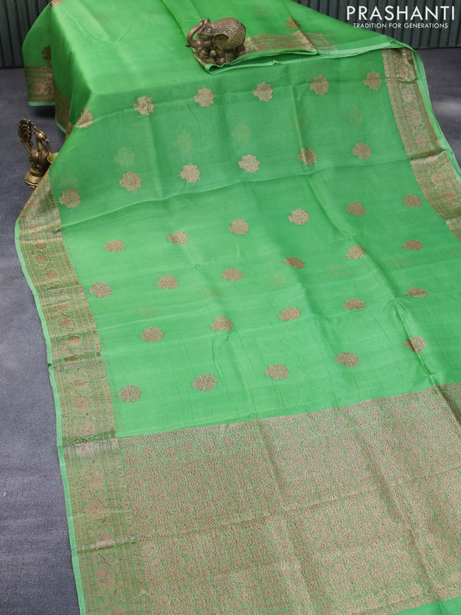 Banarasi organza silk saree light green with thread & zari woven buttas and banarasi style border