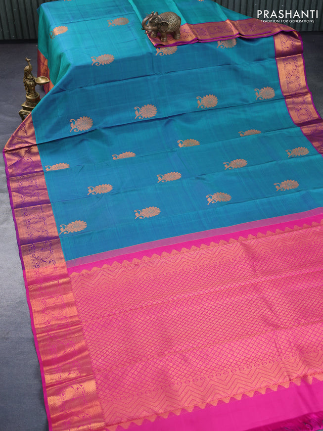 Pure kanchipuram silk saree dual shade of teal blue and pink with copper zari woven buttas and copper zari woven annam border