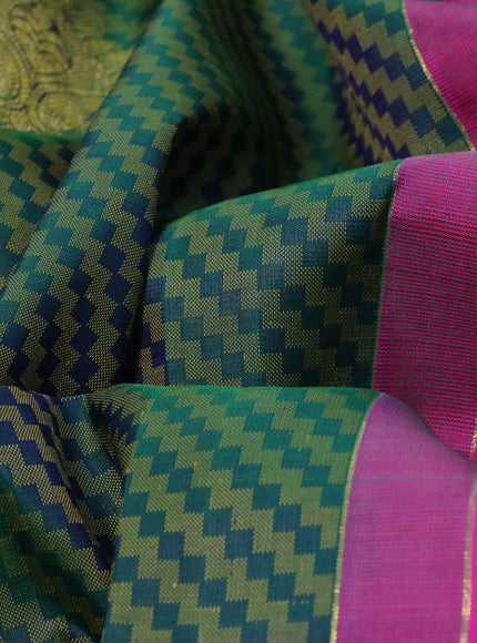 Pure kanchipuram silk saree green and pink with allover thread weaves & zari buttas and zari woven annam border