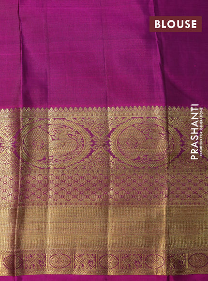 Pure kanchipuram silk saree deep jamun shade and purple with allover self emboss & zari buttas and long annam zari woven border