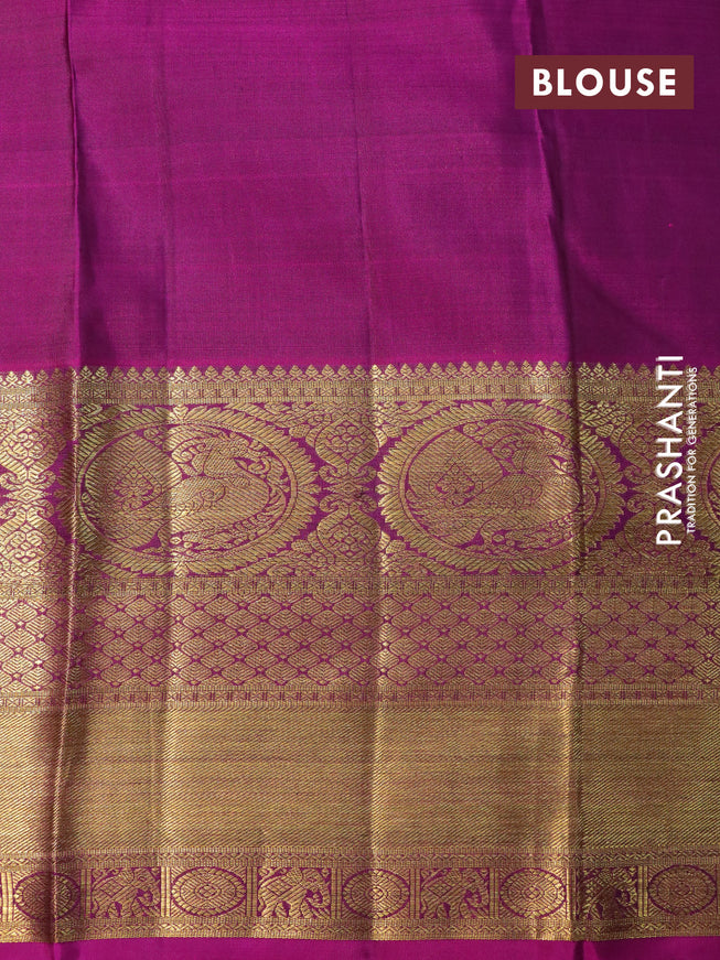 Pure kanchipuram silk saree deep jamun shade and purple with allover self emboss & zari buttas and long annam zari woven border