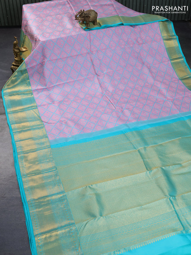 Pure kanchipuram silk saree mauve pink and teal green shade with allover patola weaves and long zari woven border