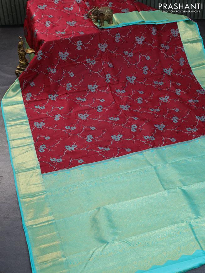 Pure kanchipuram silk saree maroon and teal blue with allover floral thread weaves and zari woven border