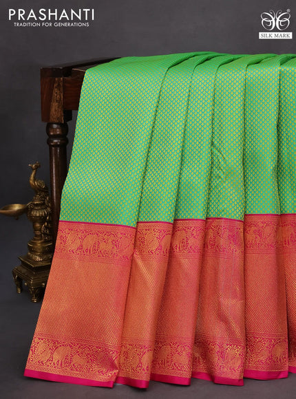 Pure kanchipuram silk saree green and pink with allover self emboss and long rich zari woven border