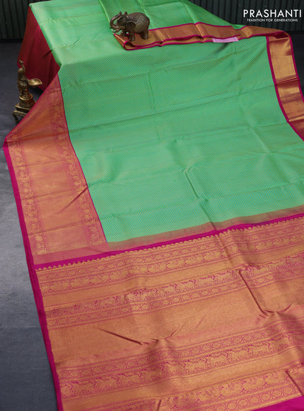 Pure kanchipuram silk saree green and pink with allover self emboss and long rich zari woven border