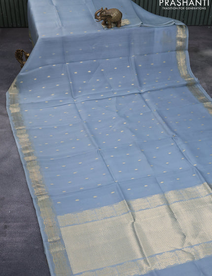 Banarasi organza silk saree grey shade with zari woven buttas and zari woven border