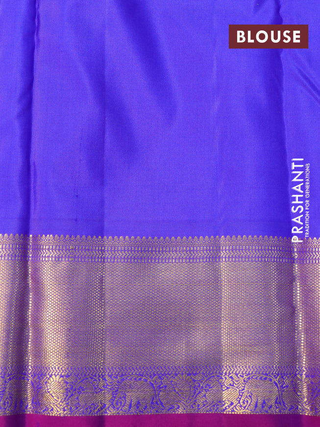 Pure kanchipuram silk saree dual shade of pinkish orange and royal blue with allover self emboss and zari woven border