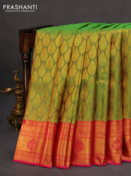 Pure kanchipuram silk saree dual shade of green and pink with allover zari woven butta weaves and rich zari woven border