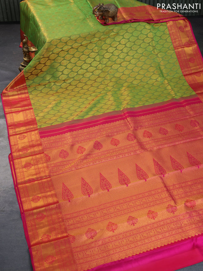 Pure kanchipuram silk saree dual shade of green and pink with allover zari woven butta weaves and rich zari woven border