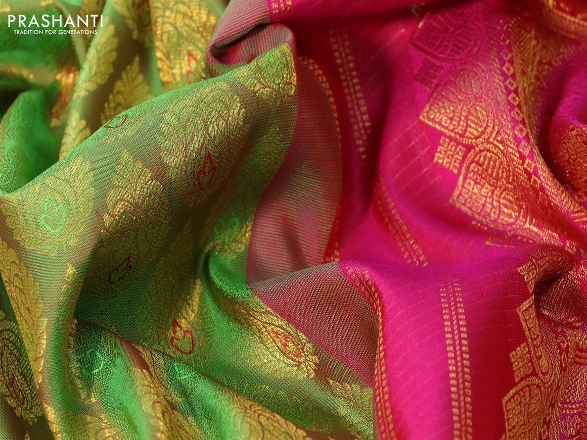 Pure kanchipuram silk saree dual shade of green and pink with allover zari woven butta weaves and rich zari woven border