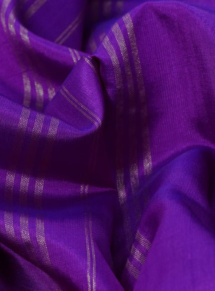 Pure kanchipuram silk saree purple and blue with plain body and temple design zari woven simple border