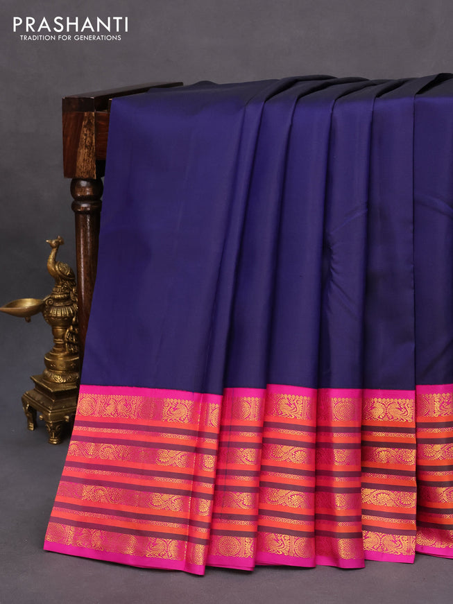 Pure kanchipuram silk saree blue and pink with plain body and zari woven border