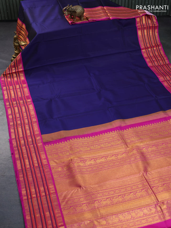 Pure kanchipuram silk saree blue and pink with plain body and zari woven border