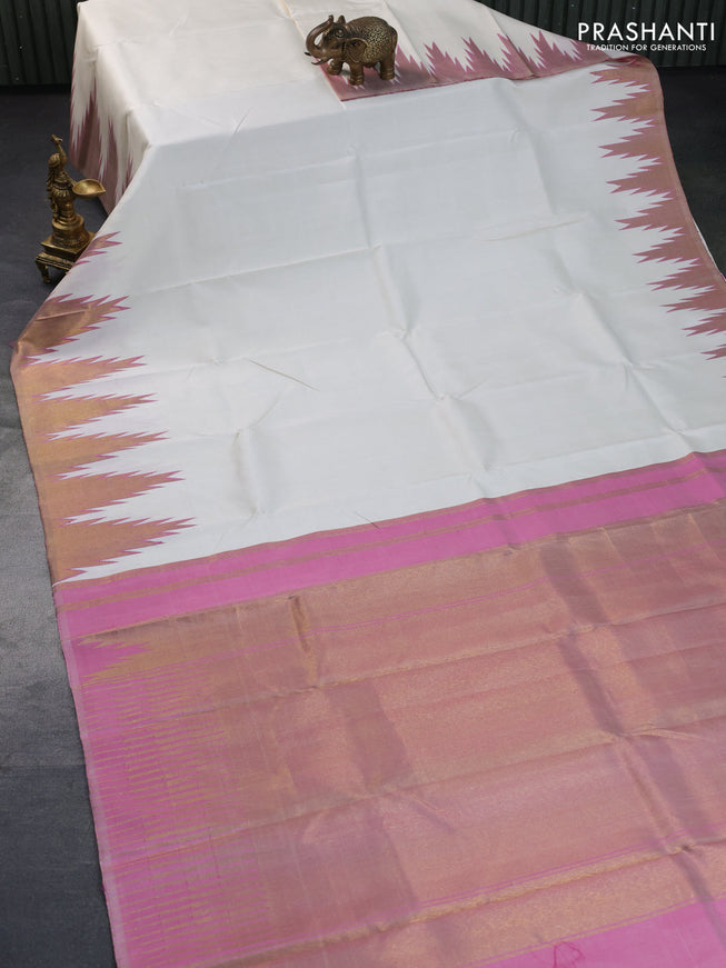 Pure kanchipuram silk saree cream and dual shade pink with plain body and temple design zari woven border