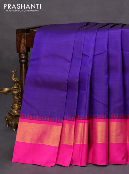 Pure kanchipuram silk saree blue and pink with plain body and temple design zari woven simple border