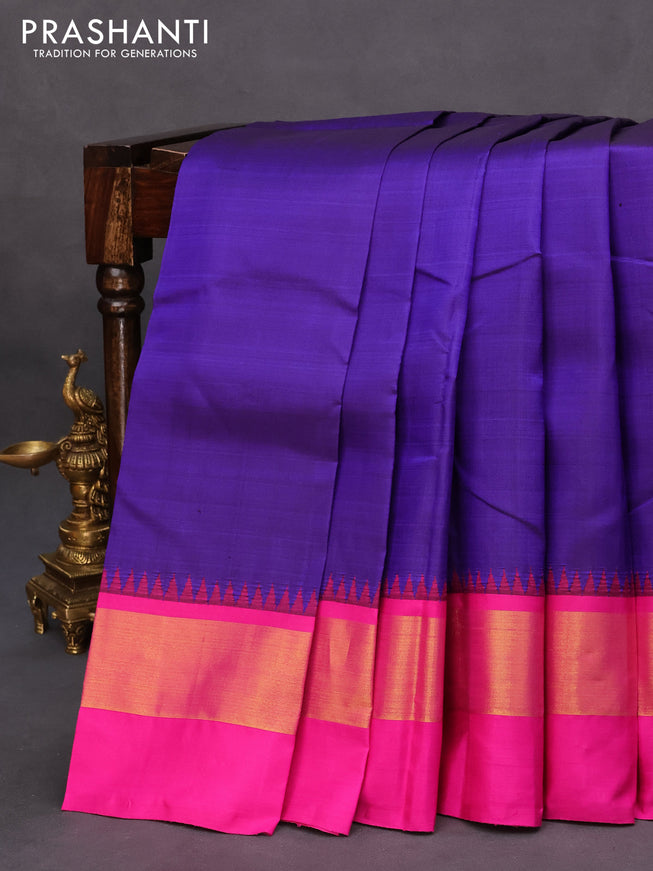 Pure kanchipuram silk saree blue and pink with plain body and temple design zari woven simple border