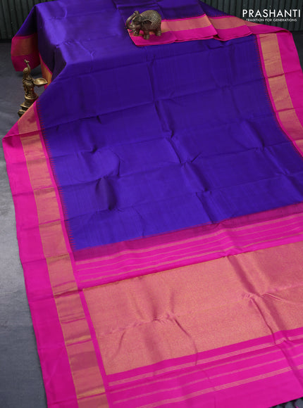 Pure kanchipuram silk saree blue and pink with plain body and temple design zari woven simple border