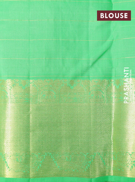 Pure kanchipuram silk saree dual shade of purple and light green with allover zari checks & buttas and rich zari woven border