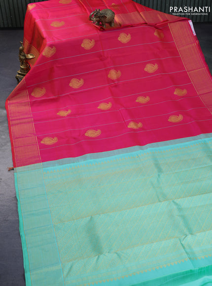 Pure kanchipuram silk saree dual shade of pinkish orange and teal greeen shade with allover thread weaves & zari buttas and zari woven border