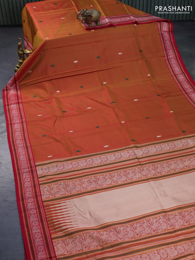 Pure kanchipuram silk saree dual shade of dark mustard and pink with thread woven buttas and thread woven border