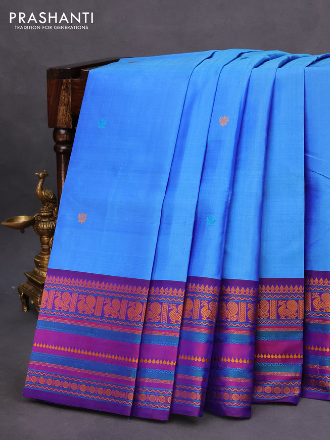 Pure kanchipuram silk saree blue and dual shade violet with thread woven buttas and long thread woven border