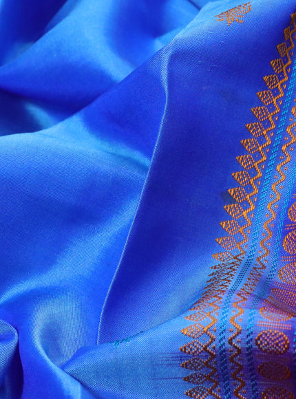 Pure kanchipuram silk saree blue and dual shade violet with thread woven buttas and long thread woven border