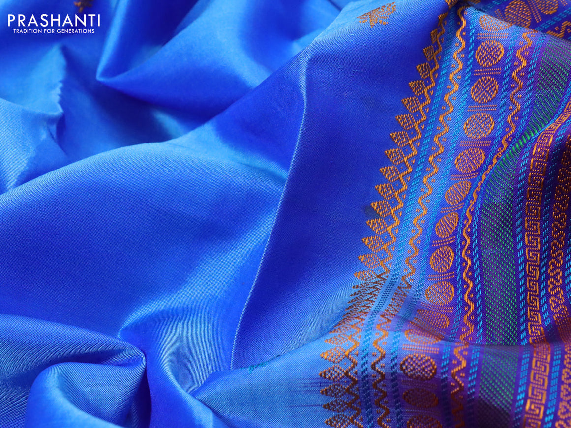 Pure kanchipuram silk saree blue and dual shade violet with thread woven buttas and long thread woven border