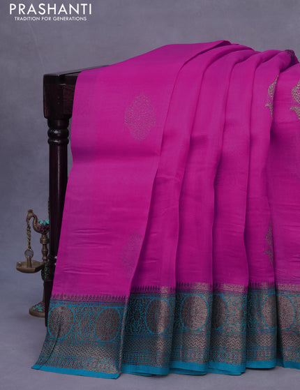 Banarasi organza silk saree pink and teal green with thread & zari woven buttas and banarasi style border