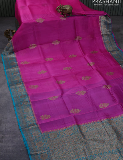 Banarasi organza silk saree pink and teal green with thread & zari woven buttas and banarasi style border