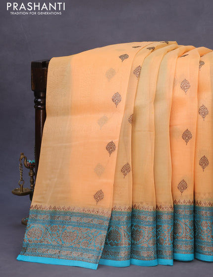 Banarasi organza silk saree pale yellow and teal blue with thread & zari woven buttas and banarasi style border