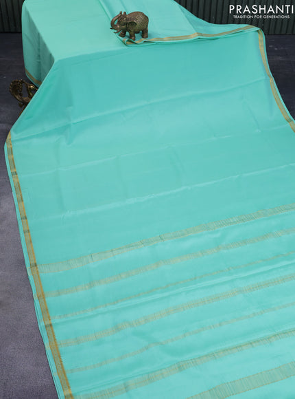 Pure mysore silk saree pastel green shade with plain body and zari woven border