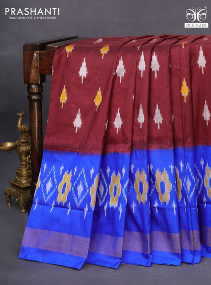 Pochampally silk saree deep maroon and blue with allover ikat butta weaves and ikat style zari border