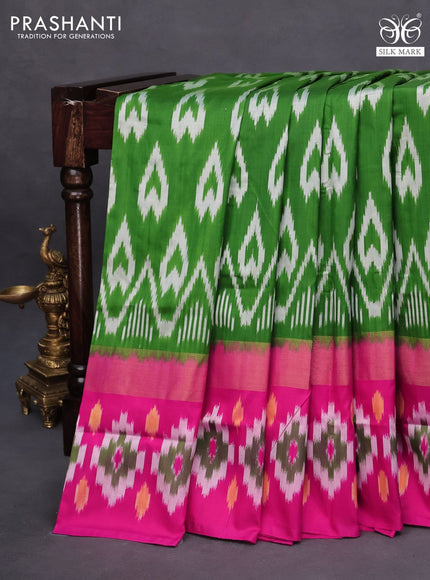 Pochampally silk saree green and pink with allover ikat butta weaves and zari woven ikat style border