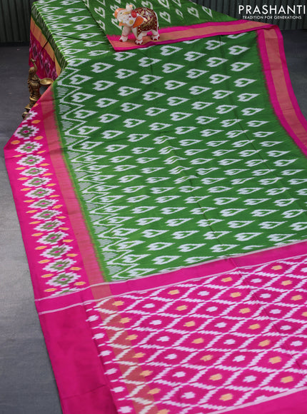 Pochampally silk saree green and pink with allover ikat butta weaves and zari woven ikat style border