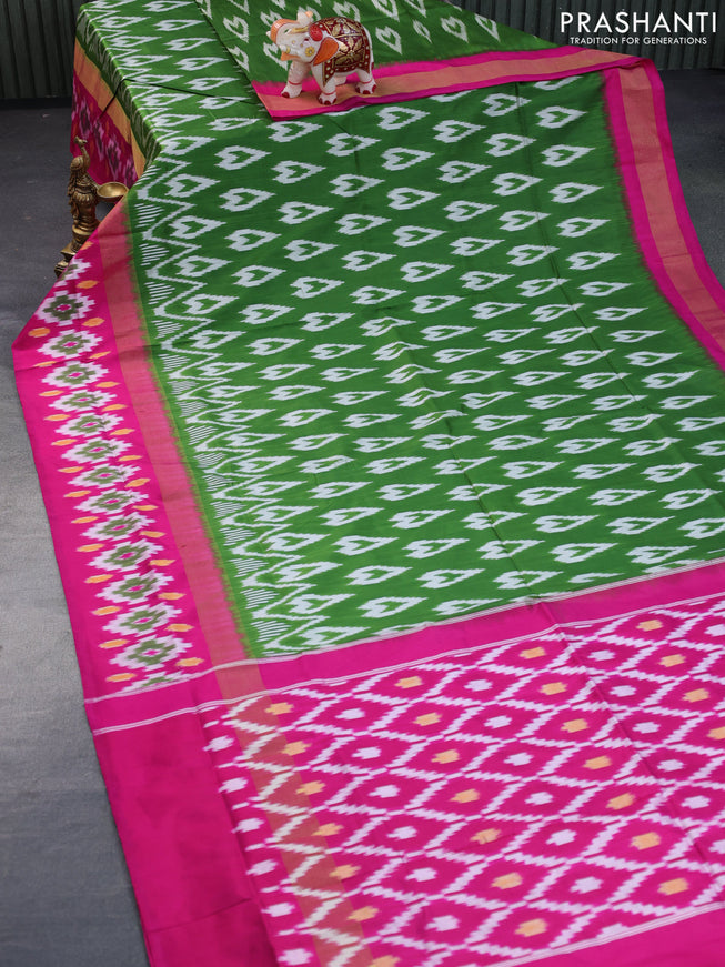 Pochampally silk saree green and pink with allover ikat butta weaves and zari woven ikat style border