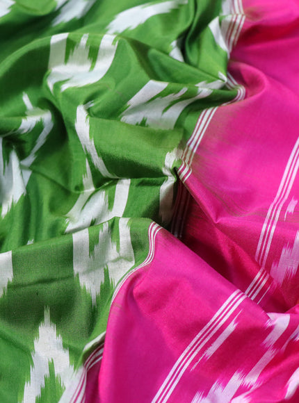 Pochampally silk saree green and pink with allover ikat butta weaves and zari woven ikat style border