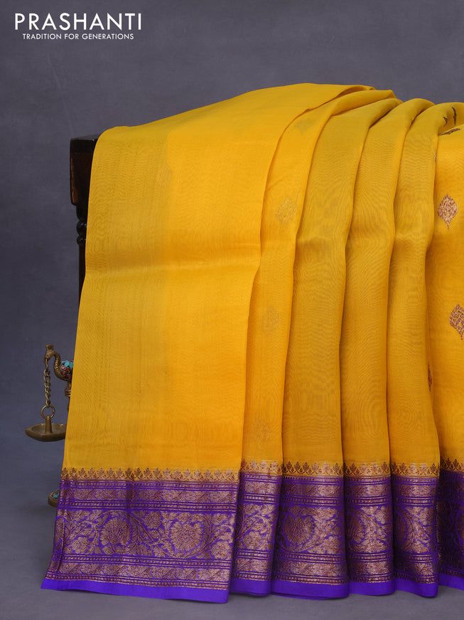 Banarasi organza silk saree mustard yellow and royal blue with thread & zari woven buttas and banarasi style border