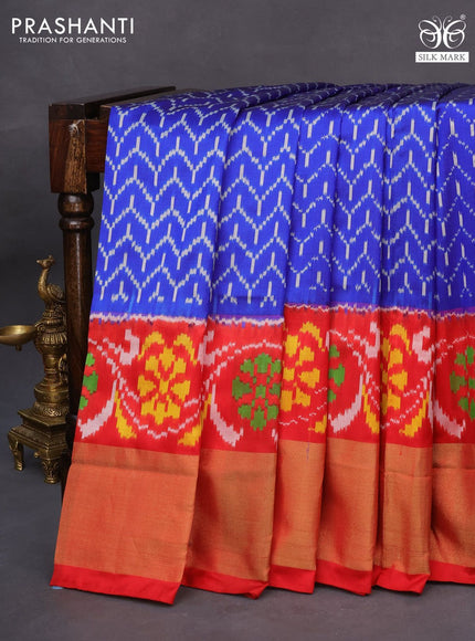 Pochampally silk saree blue and red with allover ikat weaves and ikat style zari woven border